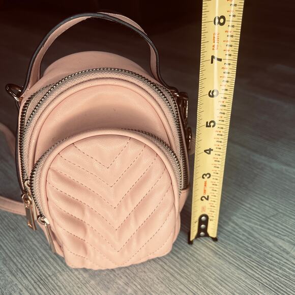 Pink mini purse with gold zipper and accents. - Picture 8 of 13